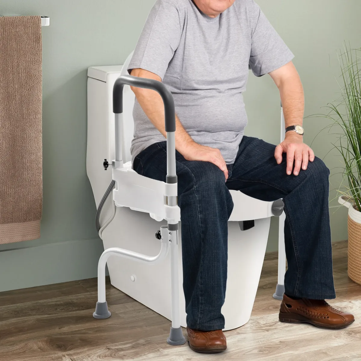 Rehausseur de toilette blanc avec accoudoirs
