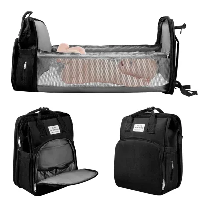 Sac à dos à langer en tissu avec matelas à langer