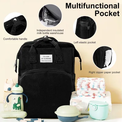 Sac à dos à langer en tissu avec matelas à langer – image 3
